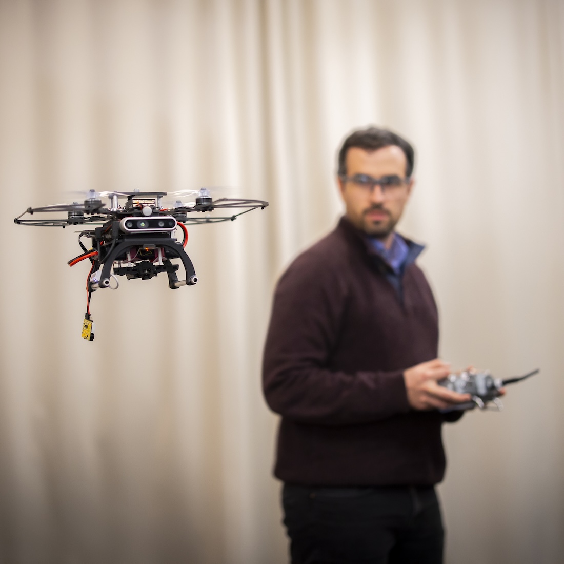 A student uses a drone