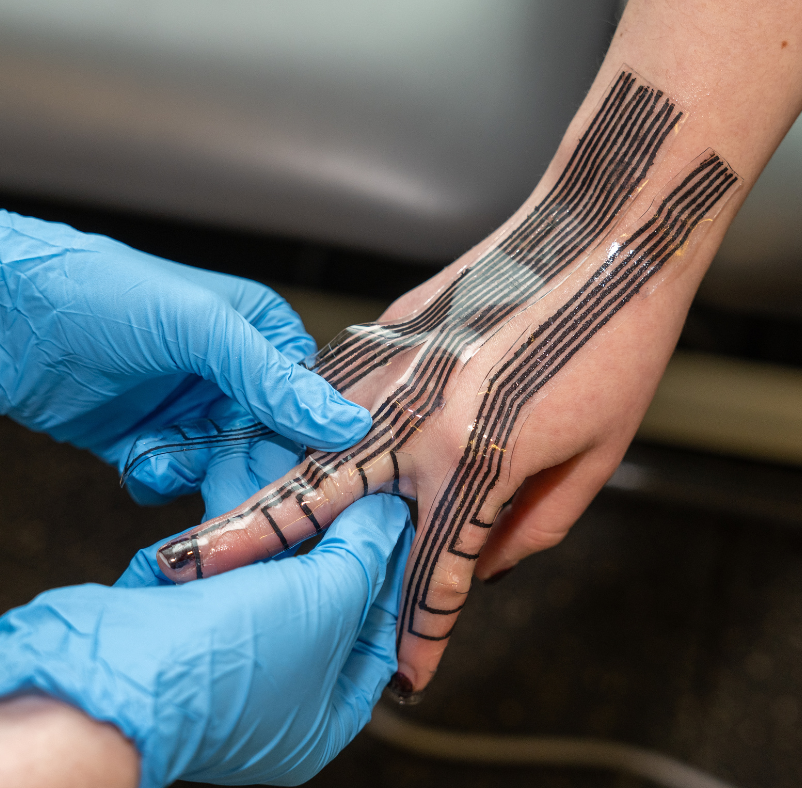Flavia Vitale demonstrates a hand glove sensor